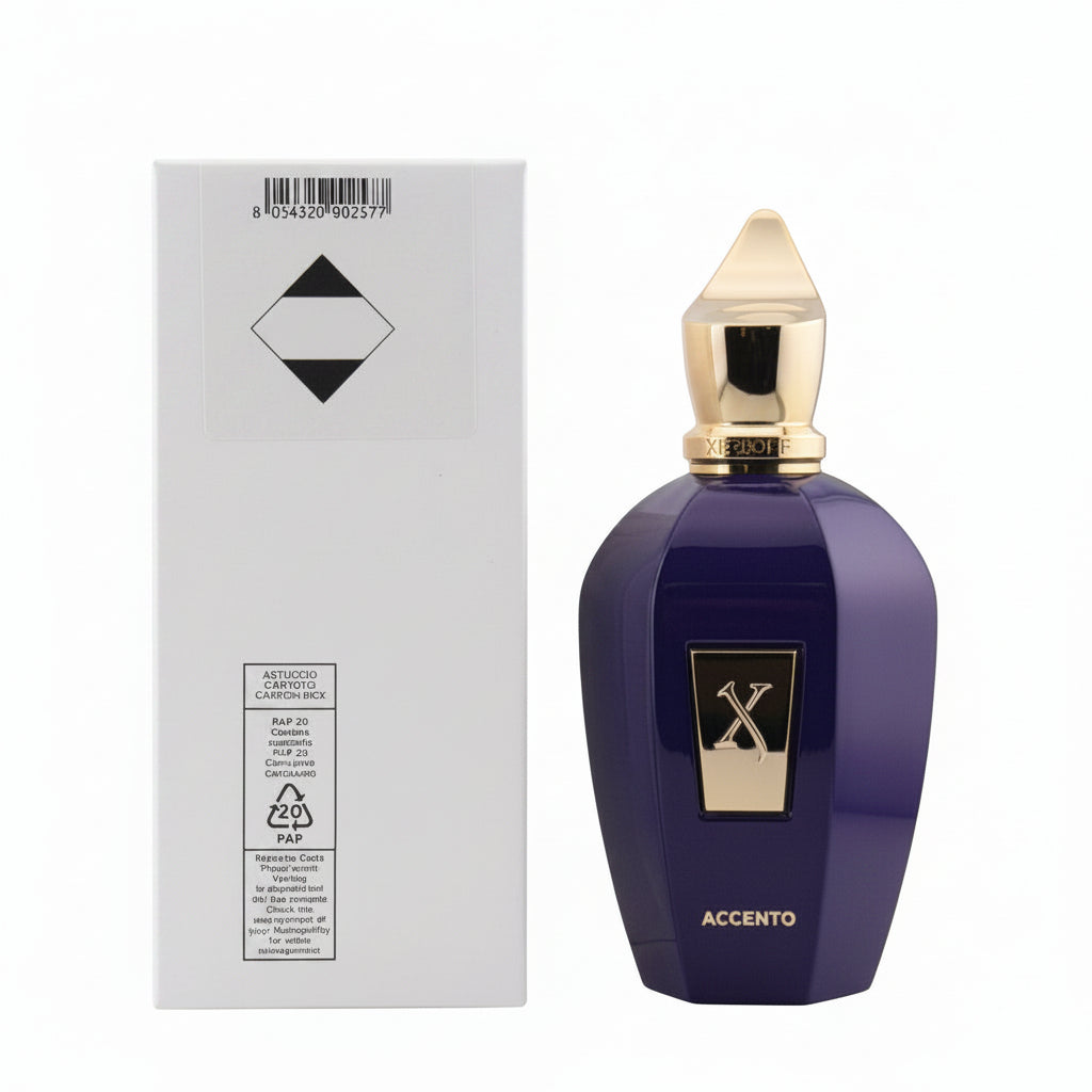 Perfume bottle with gold cap and 'Accento' branding next to its packaging on a light gray background