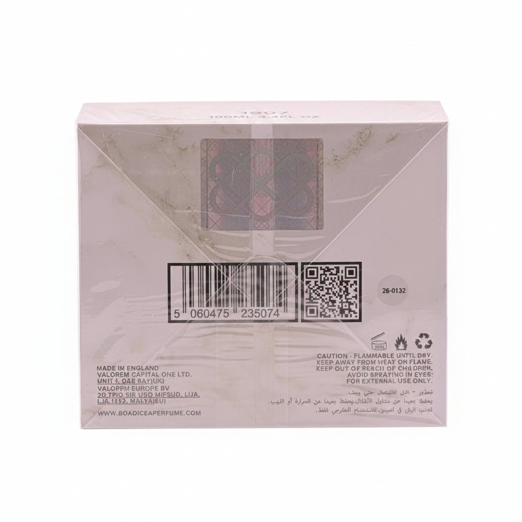 Back of a product packaging with barcode, QR code, and text on a light gray background