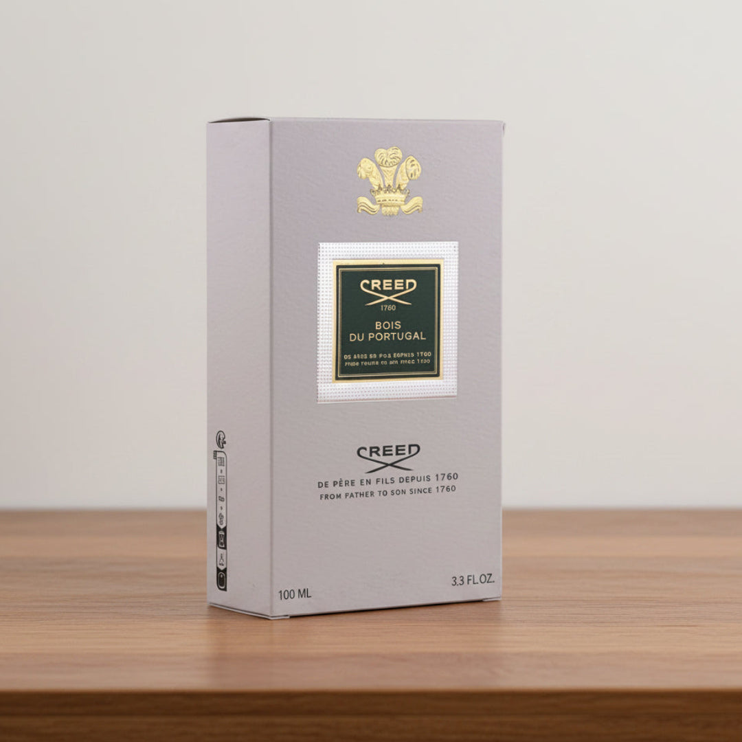 Bois du Portugal. Creed perfume box on a gray background