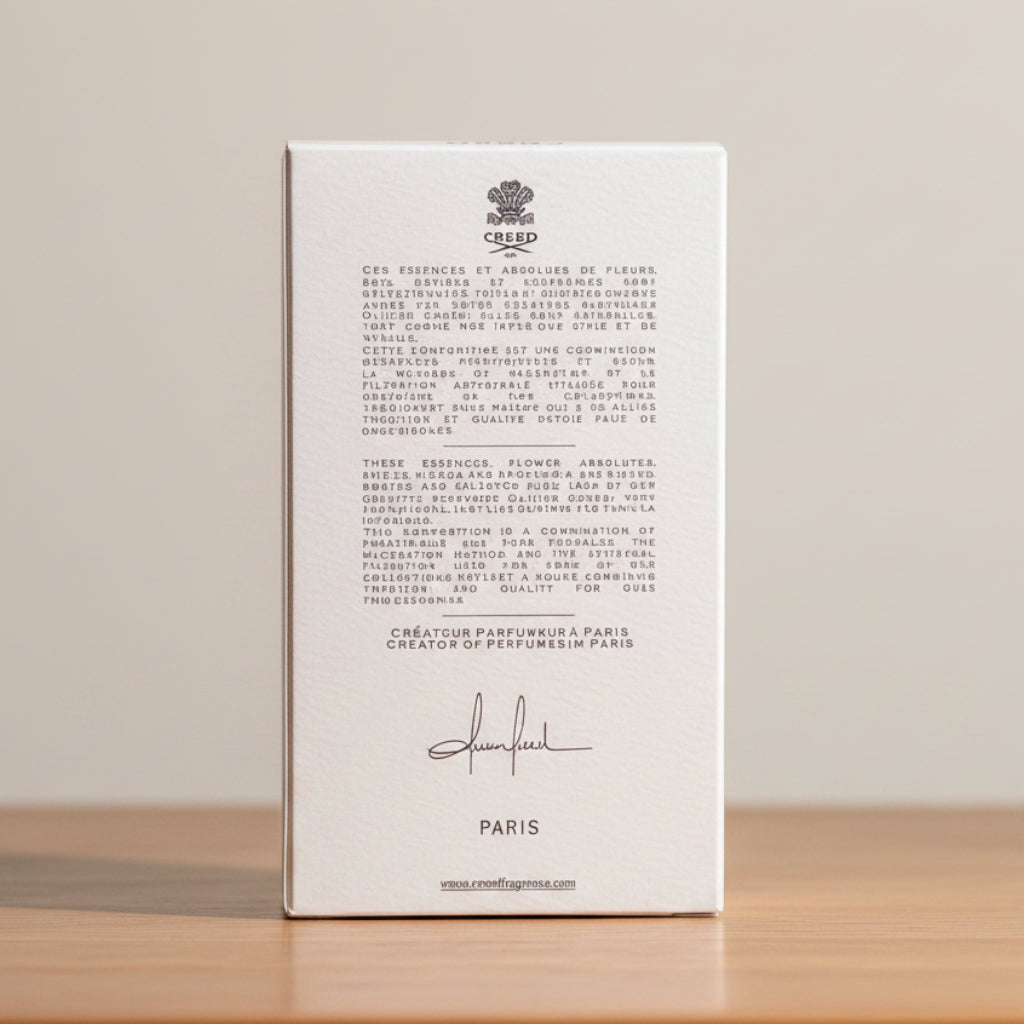 Creed Silver Mountain Water. White box with text and branding on a gray background