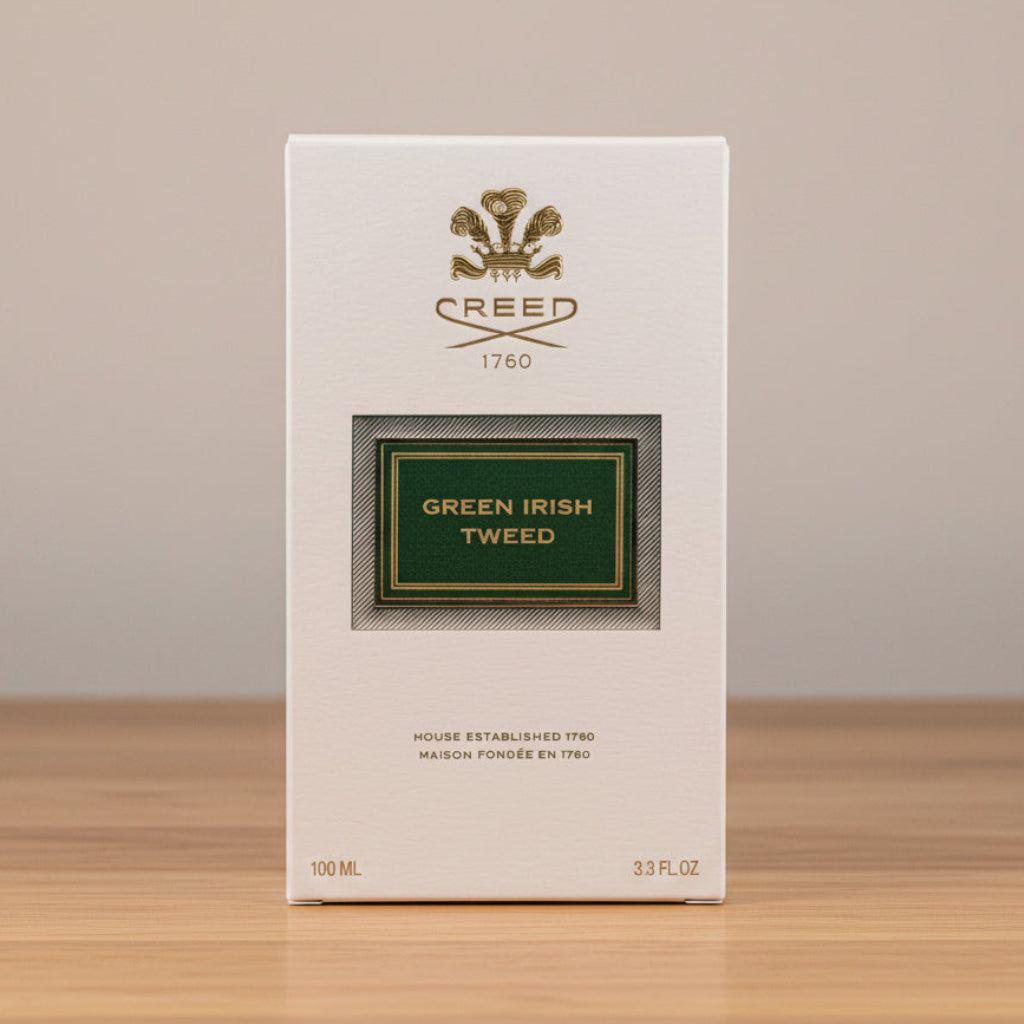 Creed Green Irish Tweed perfume packaging on a gray background