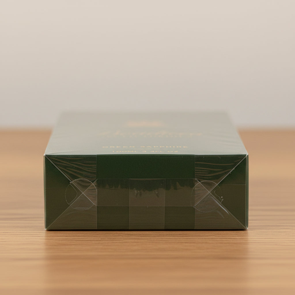 Green Sapphire Boadicea. Green box with clear window on a white background.