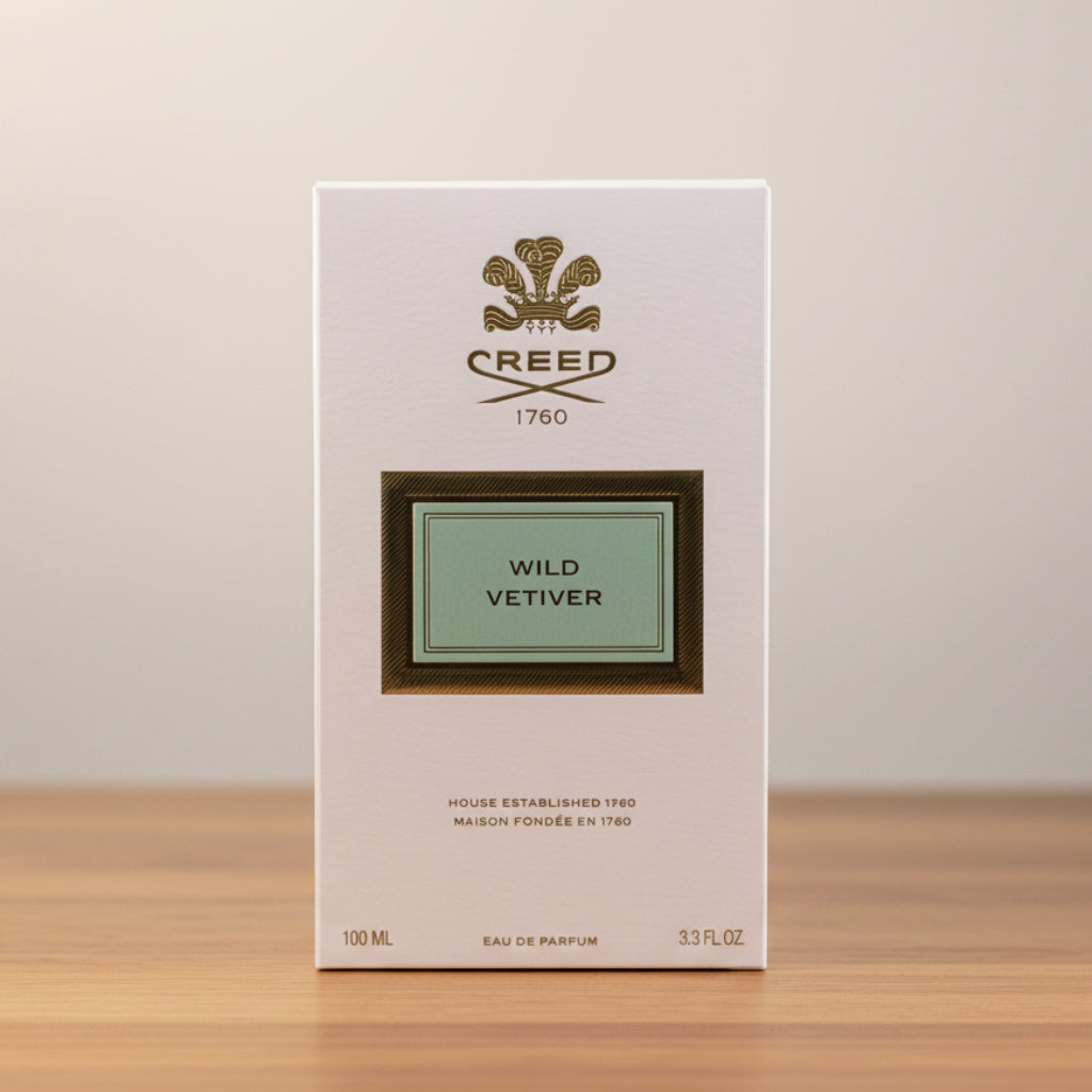Creed Wild Vetiver perfume packaging on a light gray background