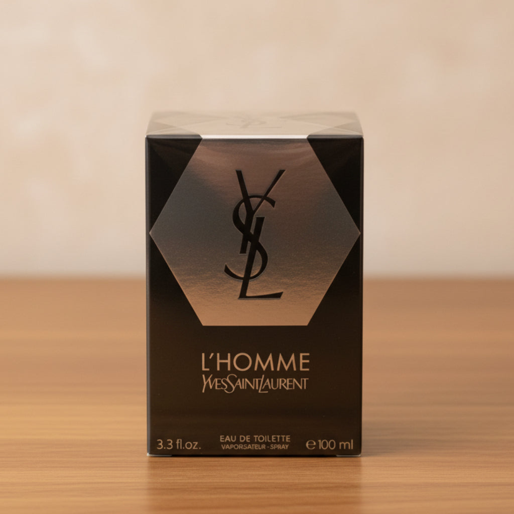 Yves Saint Laurent L'Homme Eau de Toilette 100ml box, featuring a black and silver design with the iconic YSL logo.