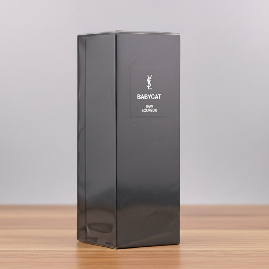 A tall, glossy black rectangular box for Babycat Hair Sculpm, featuring the white Babycat bunny logo and text on the front, set against a neutral gray background.