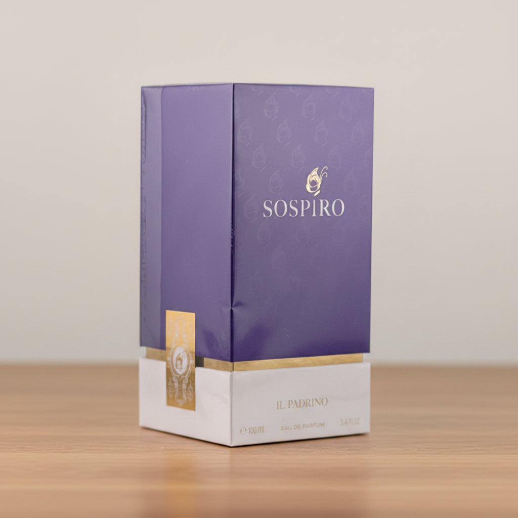 Sospiro II. Padrino Eau de Parfum packaging box, featuring a purple upper section with gold lettering and a white lower section, set against a neutral light gray background.