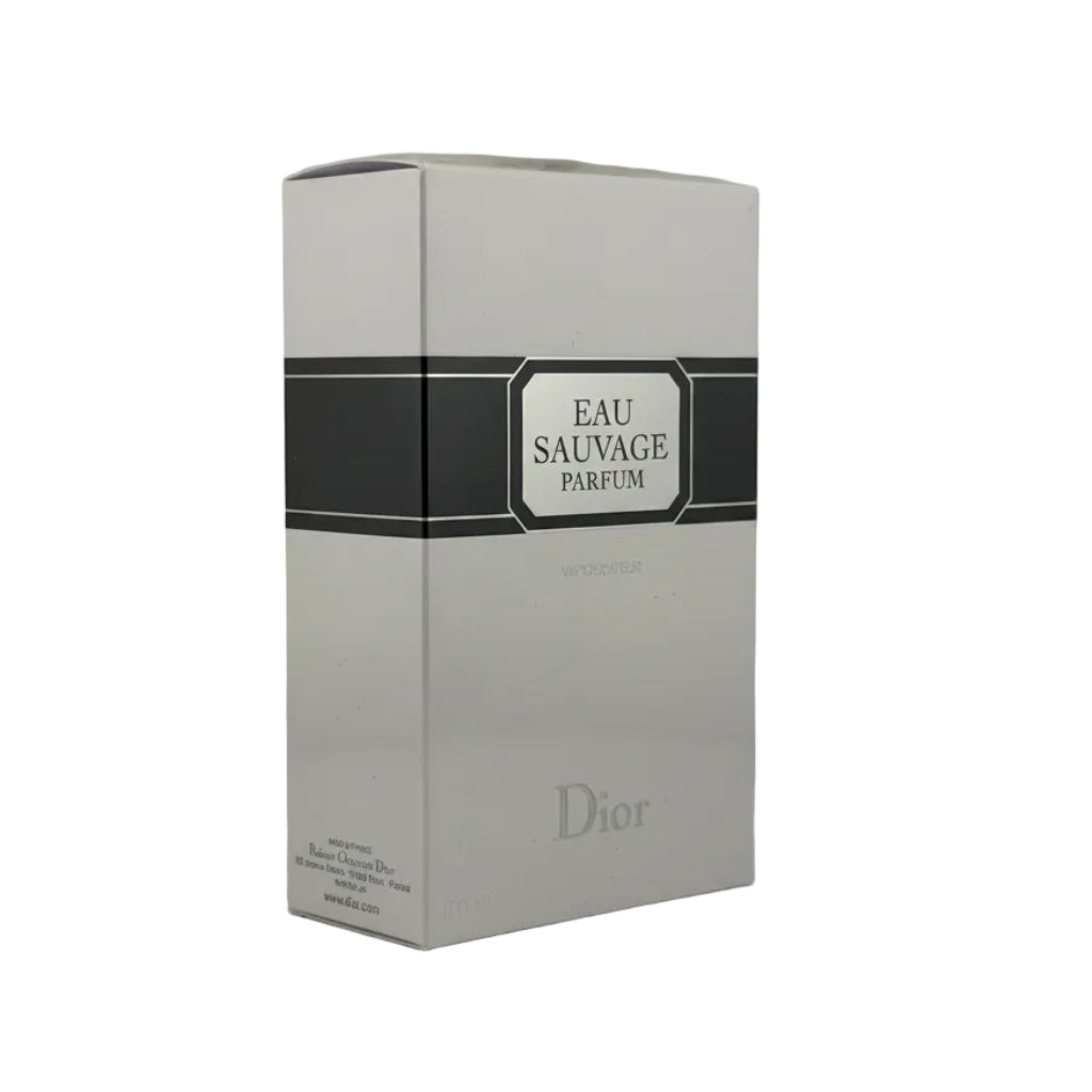 Dior Eau Sauvage Parfum box in white with black stripes and the Dior logo, photographed on a light gray background.