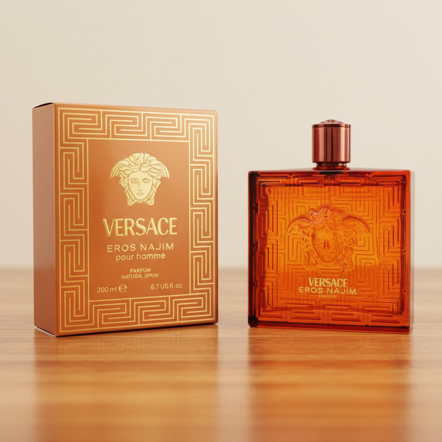 Versace Eros Najim Pour Homme perfume shown with its orange-gold box and a translucent amber bottle featuring the brand's Medusa head logo.