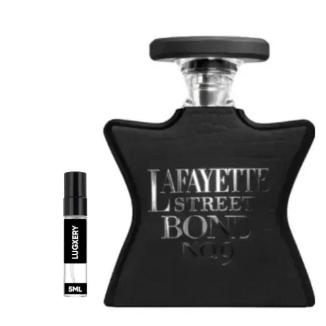 A black Bond No. 9 fragrance bottle with silver lettering, shown next to a small black and white 5ml travel atomizer spray on a plain white background.