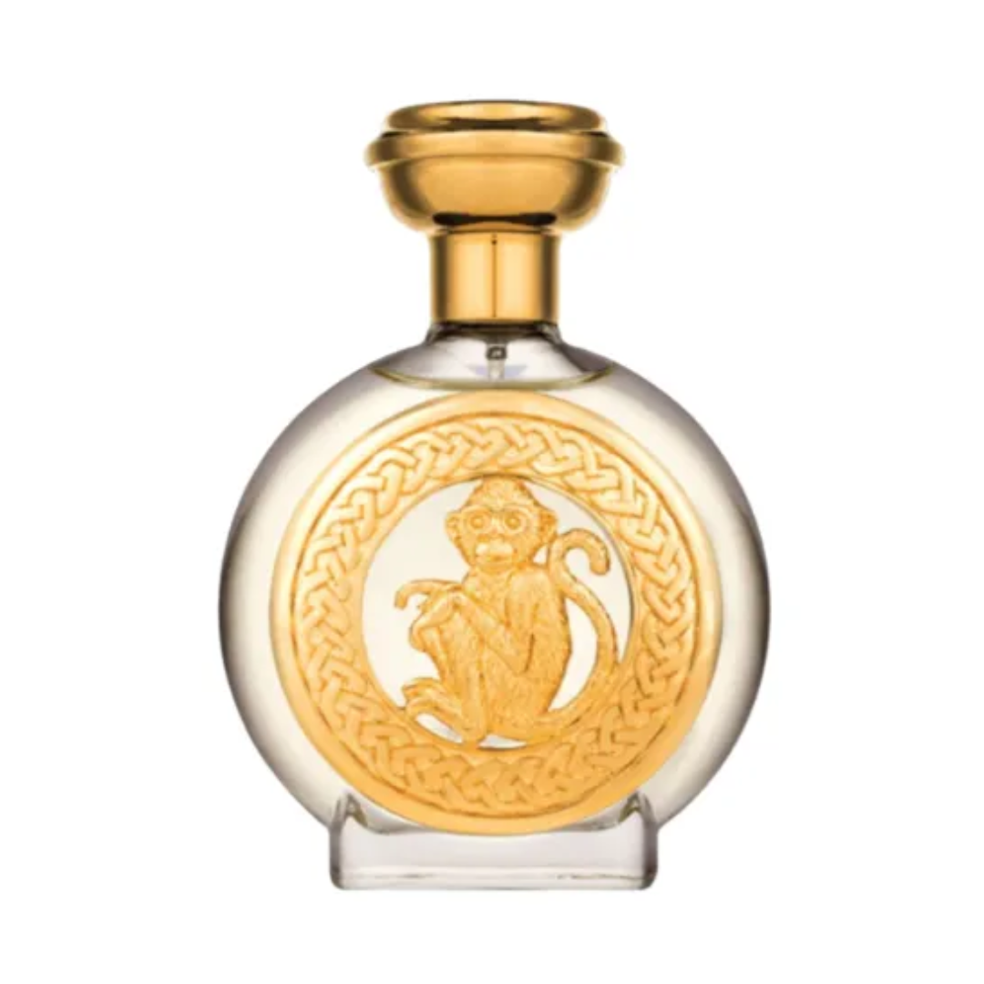 Hanuman Boadicea. Perfume bottle with gold cap and monkey design on a white background