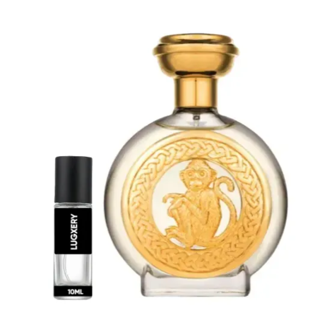 Hanuman Boadicea. Perfume bottle with gold cap and detailed design, next to a smaller black and gold rollerball bottle labeled 'Luxury'.
