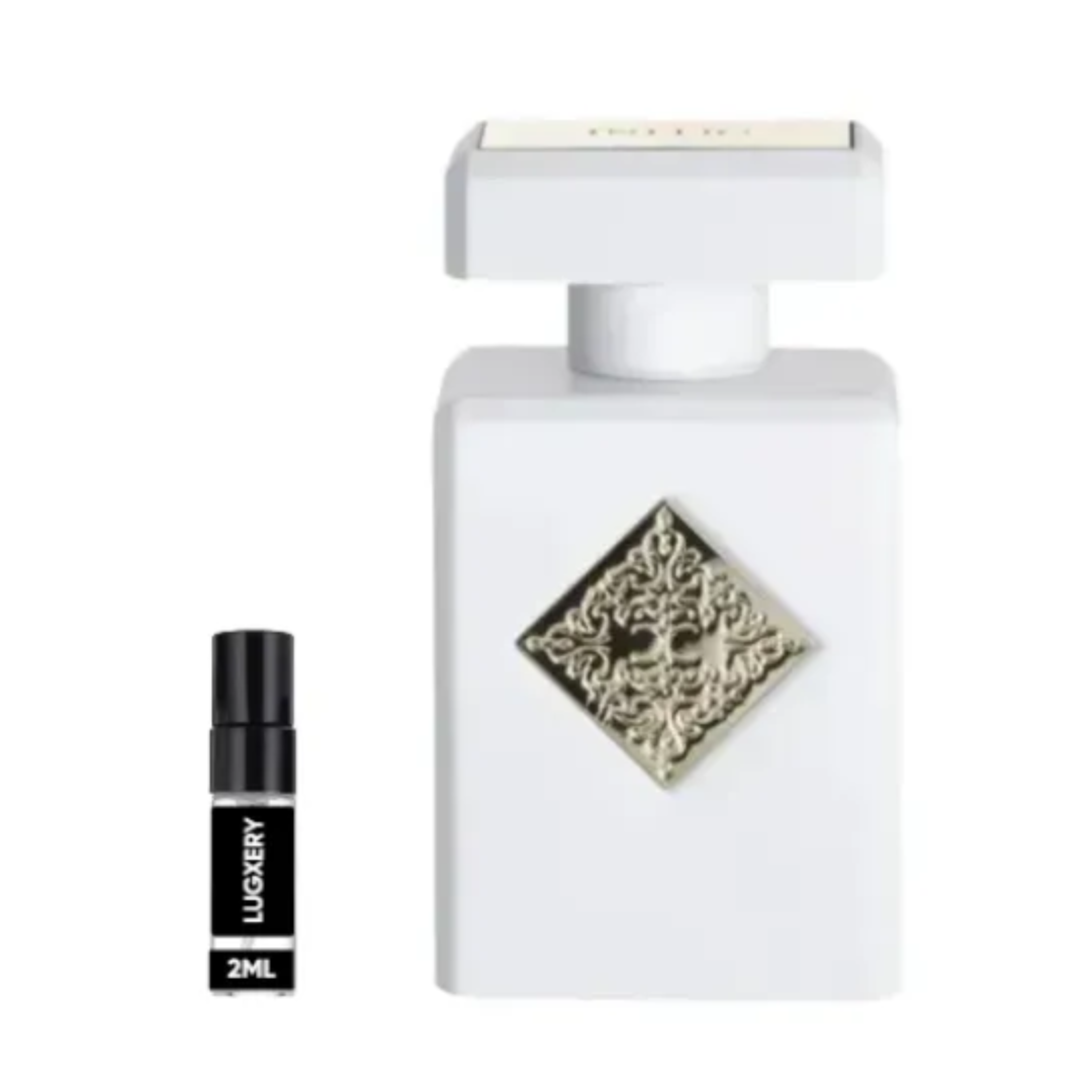 White perfume bottle with decorative cap on a white background