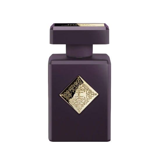 Purple perfume bottle with gold decorative emblem on a white background