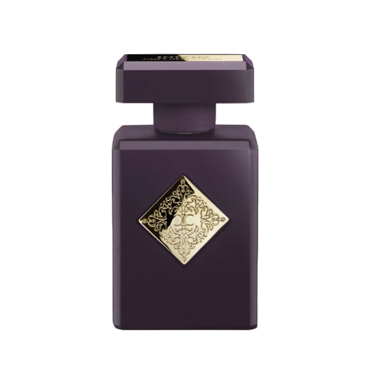 Purple perfume bottle with gold decorative emblem on a white background