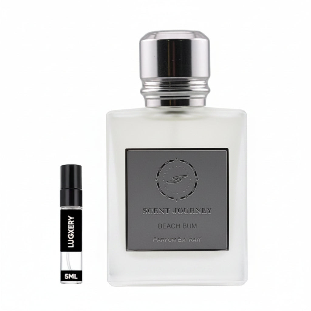 Scent Journey Beach Bum perfume bottle in a matte taupe-gray color with a shiny silver cap, shown next to a small black and white sample vial labeled 5ml by Luxery on a plain white background.