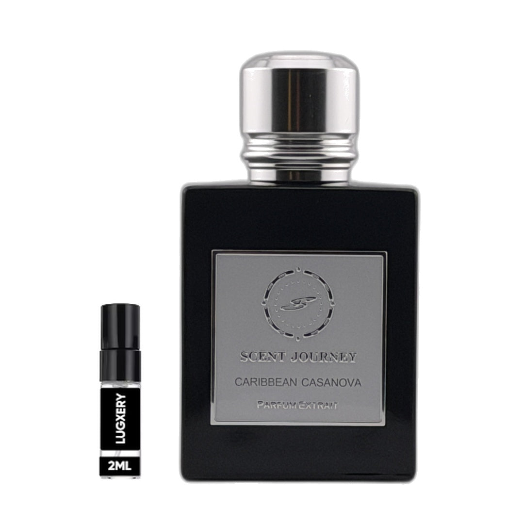 A black rectangular perfume bottle with a silver cap and a silver front label reading 'SCENT JOURNEY' and 'CARIBBEAN CASANOVA', shown next to a small black 2ml sample vial labeled 'LUXURY'.
