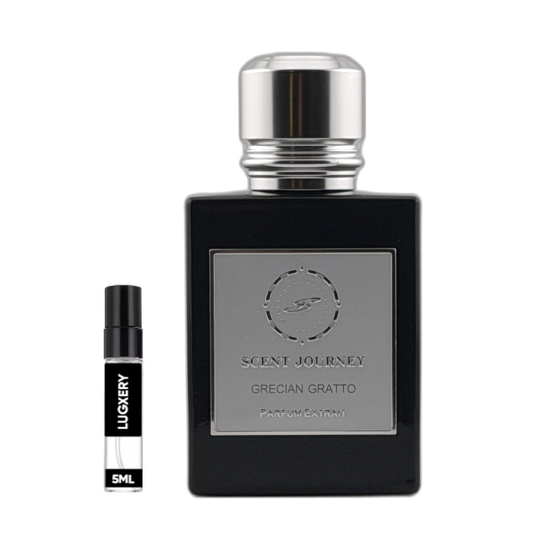 A black rectangular perfume bottle with a silver cap and a silver front label reading 'SCENT JOURNEY BOURBON & BLUEGRASS' is shown beside a small black-and-white sample spray vial labeled 'LUGERY 5ML' on a plain white background.