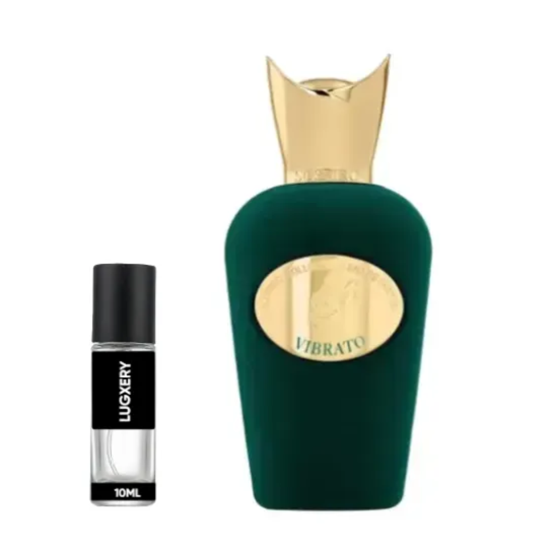 Green perfume bottle with gold cap and black rollerball bottle labeled 'Luxury' on a white background